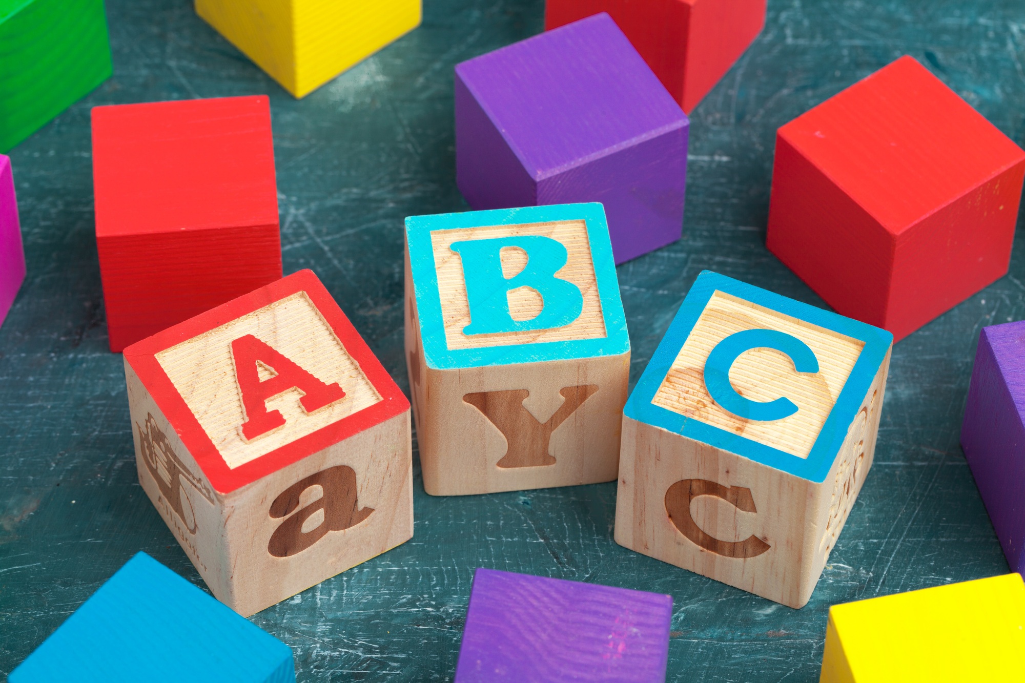 Alphabet blocks ABC on wooden table