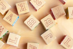 Alphabet blocks ABC on wooden table