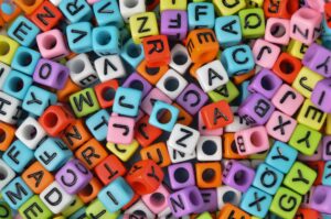 Close up view of colorful alphabet beads