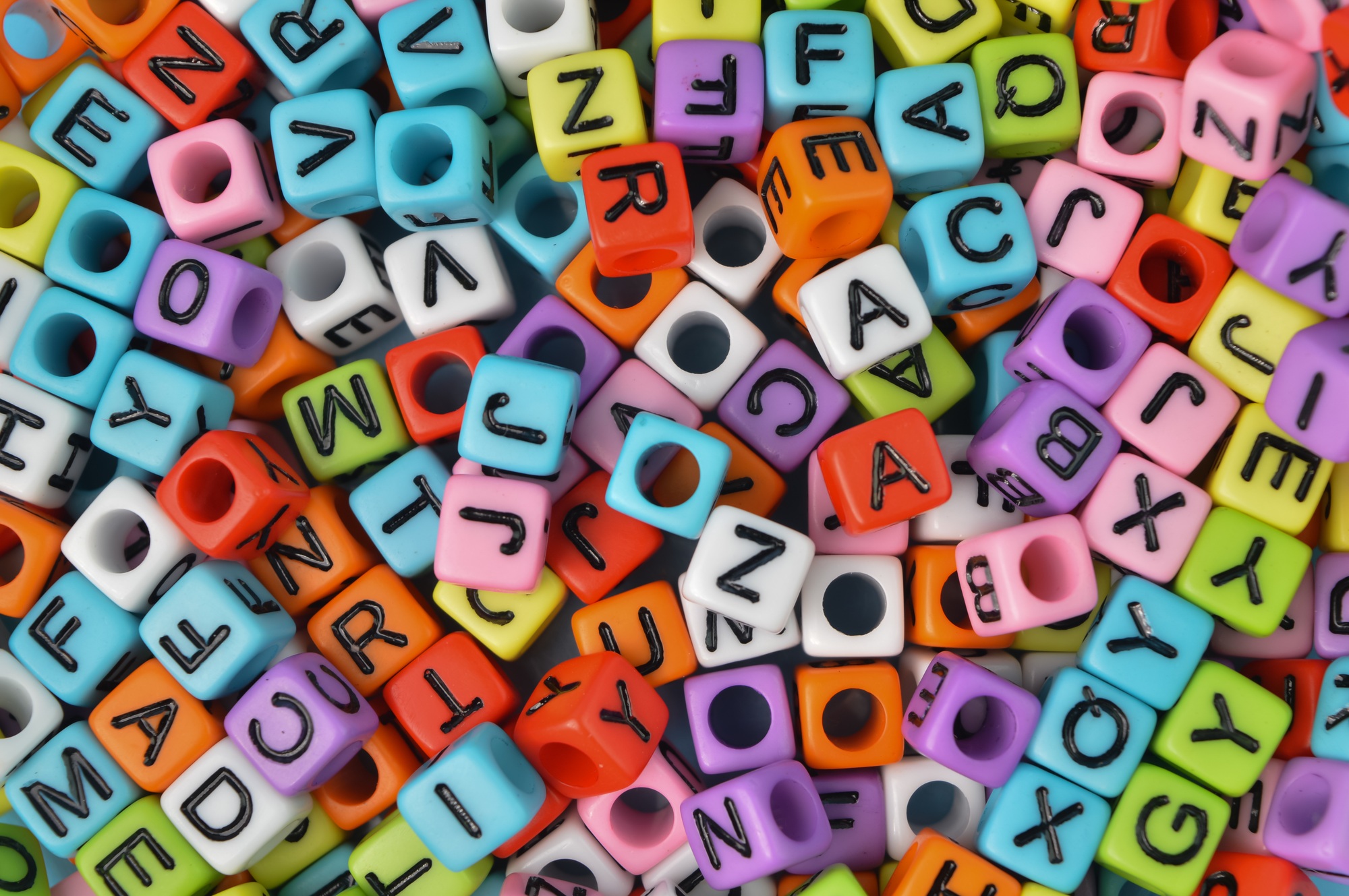 Close up view of colorful alphabet beads