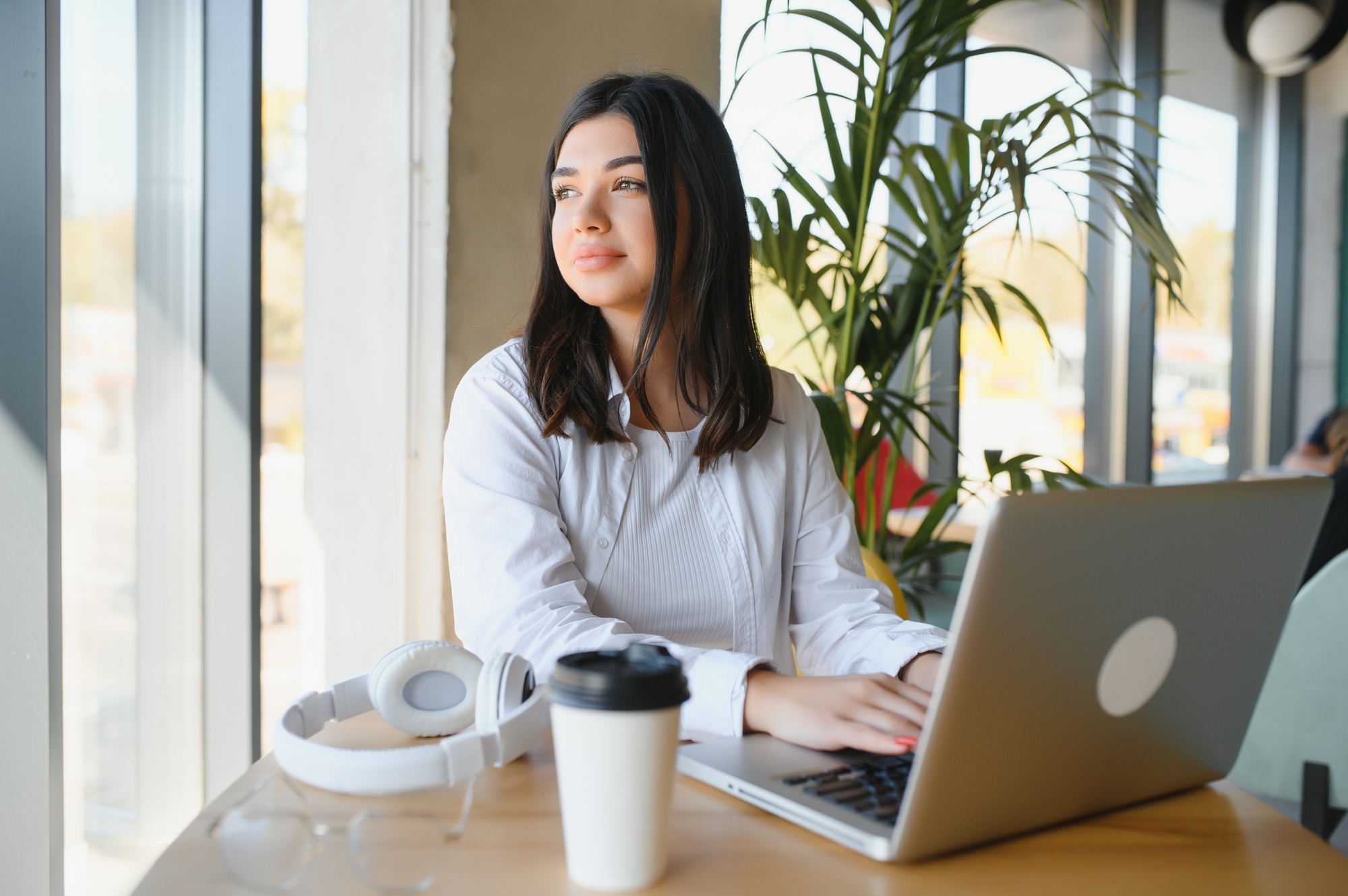 Smiling girl student study online with skype teacher
