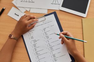Student writing test at lesson
