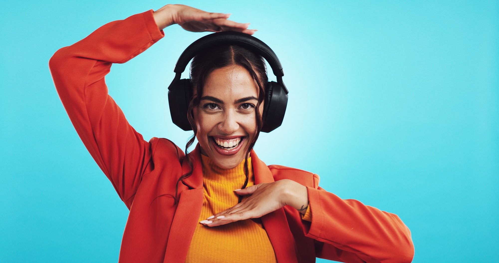 Video call, headphones and portrait of woman in studio for online tutor, english teacher or hand fr
