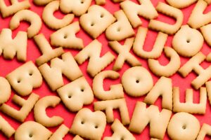 Word biscuit over red background