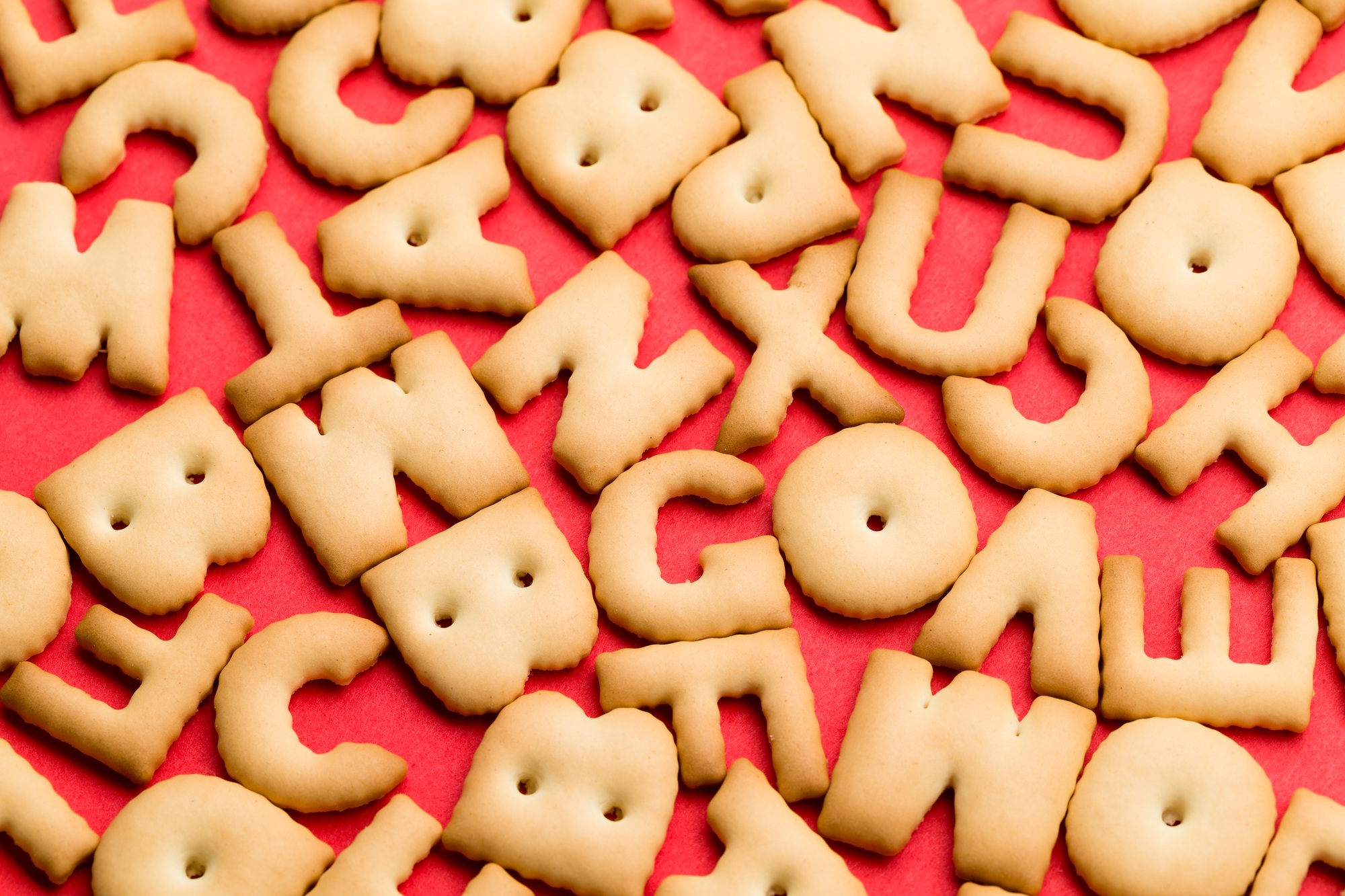 Word biscuit over red background